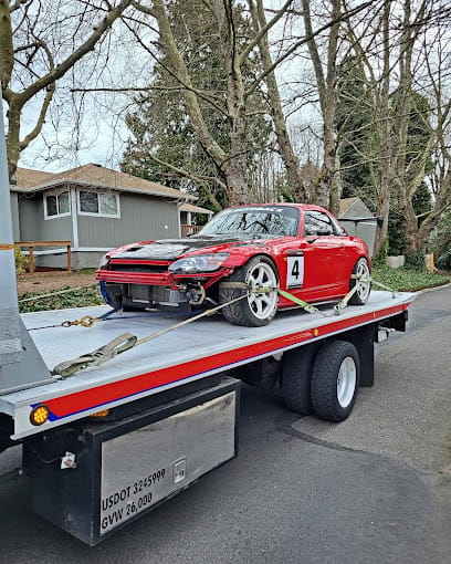 Lowered sports car being towed in Kirkland, WA.